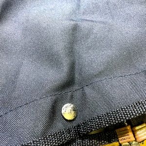 Bag Rain Cover in black with 4 snap bottons